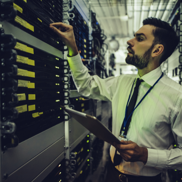 man in data centre